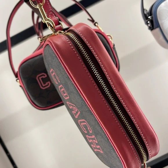 Coach Jamie Wristlet In Signature Canvas With Varsity Motif
IM/Brown/Watermelon - Picture 5 of 16